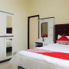 Отель OYO 1126 Trio R Kost Syariah, фото 4