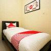 Отель Oyo 662 Miracle Homestay Syariah, фото 6