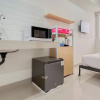Отель Good And Homey Studio (No Kitchen) Apartment Bandaraya - Tallasa City Makassar, фото 12