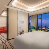 Отель Ramada by Wyndham Mengzi Suites, фото 13