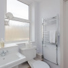 Отель Newly Refurbished 4 Bedroom House in East London, фото 8