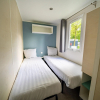 Отель Well-maintained chalet with WiFi, in a green holiday park near Amsterdam, фото 25