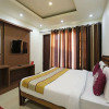 Отель OYO 7905 Holiday Inn, фото 7