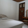 Отель OYO 93706 Penginapan Syariah Hj. Kenan, фото 3