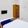 Отель SPOT ON 91824 Rumah Kaloka Syariah, фото 6