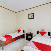 Отель Collection O 90461 Graha Atmadja Syariah Guest House, фото 5