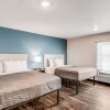 Отель Woodspring Suites  West Des Moines, фото 4