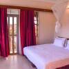 Отель Go Around Kampala all day to Return to Your Wonderful Apartment, фото 2