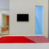 Отель Capital O 3905 Graha 100 Guest House Syariah, фото 27