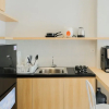 Отель Homey and Simple 1BR at Asatti Apartment, фото 9