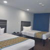 Отель Travelers Inn & Suites, фото 13