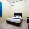Отель Tiga Mas Inn by OYO Rooms, фото 10