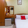 Отель RedDoorz Nam Bac Hotel Phan Dang Luu Phu Nhuan, фото 5