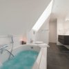 Отель Beautiful Holiday Home With Bubble Bath and Sauna in a Quiet Area in Zeeland, фото 16