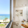 Отель Beachfront w SeaView In a beautiful bldg, фото 7
