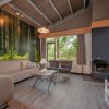 Отель Restyled Bungalow With Dishwasher Near a Nature Reserve, фото 11