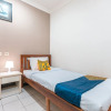 Отель SPOT ON 2033 Kayumanis Homestay Syariah, фото 19