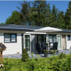 Отель Tidy Chalet With Dishwasher, Surrounded by Forest, фото 1