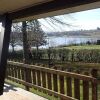 Отель Detached Chalet With Views of the Lake of Butgenbach in the Middle of Nature, фото 2