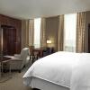 Отель Sheraton Suites Calgary Eau Claire, фото 2