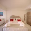 Отель Geco di Giada Exclusive Art Suites в Ольбии