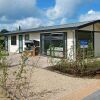 Отель Charming Chalet With Dishwasher in Noordwijk, фото 1