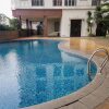 Отель Comfortable And Simply Studio At Serpong Greenview Apartment, фото 7