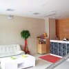 Отель Yijiayuan Business Hotel, фото 2