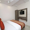 Отель OYO 11593 Hotel Aman Guest House, фото 4