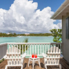 Отель Peace & Plenty Island Cottages, фото 1