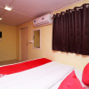 Отель OYO 23699 People's  Castle, фото 14