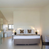 Отель The Ixian All Suites, фото 6