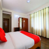 Отель OYO 14218 Elixir Cottage, фото 7