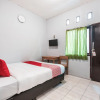 Отель OYO Living 1756 Amira Guest House, фото 4