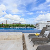 Отель IN 03 2 Bedroom+ 6 people+ Mamitas Beach Area- 1block from beach Apts, фото 1