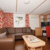 Отель Comfortable Chalet with Combi-Microwave, in a Green Area, фото 2