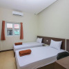 Отель OYO 90162 Remboelan Guest House, фото 10
