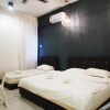 Отель OYO HOME 90647 Mac Inn 94, фото 2