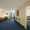 Отель Days Inn & Suites by Wyndham Altoona, фото 20