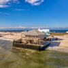 Отель West Beach - Stay On The Sand! Gulf Views Galore, Only Steps To The Shore! 4 Bedroom Home by RedAwni, фото 1