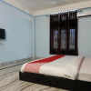 Отель OYO 17077 Elegant Guest House, фото 6