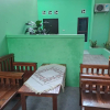 Отель OYO 93695 Guest House Riharti Syariah, фото 10