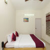 Отель OYO 9260 Olive Castles Inn, фото 17