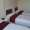 Отель Yining Huarui Business Hotel в Иньине