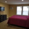 Отель Village Motel, фото 1