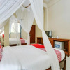 Отель OYO 90640 Agung Kartini Villa, фото 7