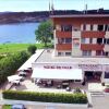 Отель INTER-HOTEL Le Pont Sud Hostellerie la Baie du Lac в Л'Аббеи