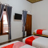 Отель OYO 1230 Kampoeng Osing Syariah Guesthouse, фото 26