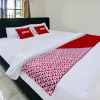 Отель OYO 92059 Archi Homestay, фото 7