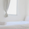 Отель Comfortable 2BR at Emerald Bintaro Apartment, фото 2